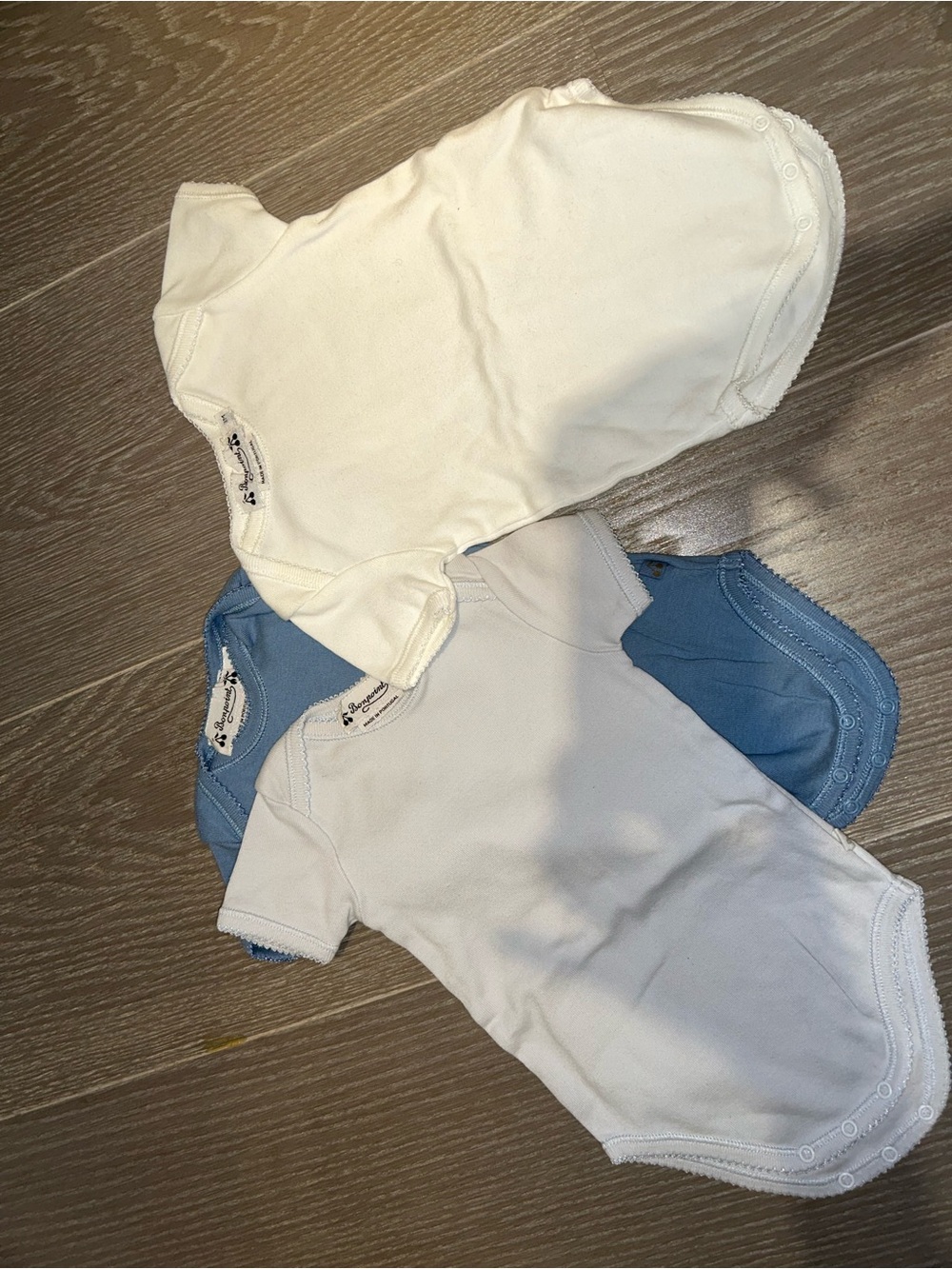 Bonpoint White, Cream, and Blue Baby One-Piece Bodysuits - Set of 3